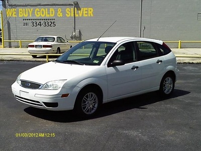 ford focus 2007 white hatchback zx5 se gasoline 4 cylinders front wheel drive automatic 77565