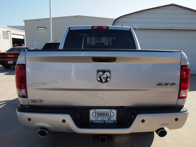 ram 1500 2012 silver laramie limited gasoline 8 cylinders 4 wheel drive automatic 77375