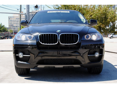 bmw x6 2011 black xdrive35i gasoline 6 cylinders all whee drive automatic 77002