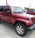 jeep wrangler unlimited 2013 red suv sahara gasoline 6 cylinders 4 wheel drive automatic 34731