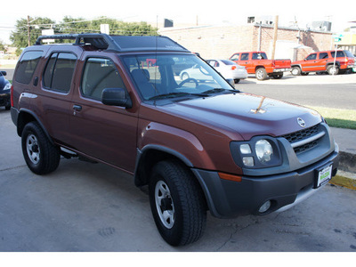 nissan xterra 2002 brown suv se gasoline 6 cylinders 4 wheel drive automatic 78757