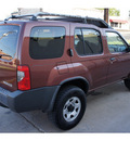 nissan xterra 2002 brown suv se gasoline 6 cylinders 4 wheel drive automatic 78757