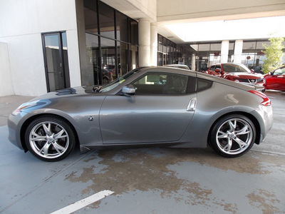 nissan 370z 2011 silver coupe touring gasoline 6 cylinders rear wheel drive 6 speed manual 77477