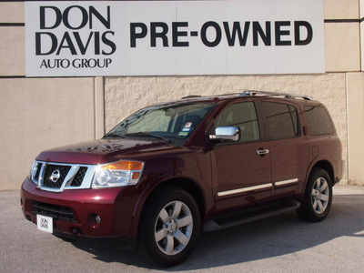 nissan armada 2010 dk  red suv titanium flex fuel 8 cylinders 2 wheel drive automatic 76011