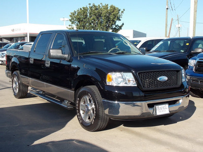 ford f 150 2006 black xlt gasoline 8 cylinders rear wheel drive automatic with overdrive 77074