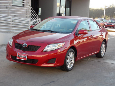 toyota corolla 2009 red sedan le gasoline 4 cylinders front wheel drive automatic with overdrive 77074