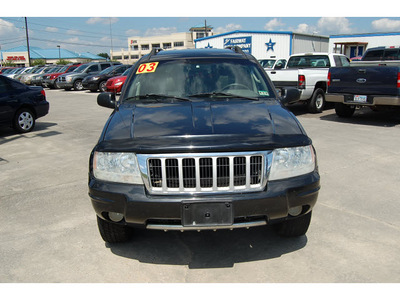 jeep grand cherokee 2004 black suv limited gasoline 8 cylinders rear wheel drive automatic with overdrive 77627