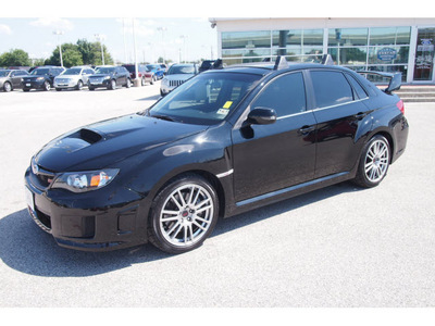 subaru impreza wrx 2011 black sedan sti gasoline 4 cylinders all whee drive 6 speed manual 77074