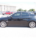 subaru impreza wrx 2011 black sedan sti gasoline 4 cylinders all whee drive 6 speed manual 77074