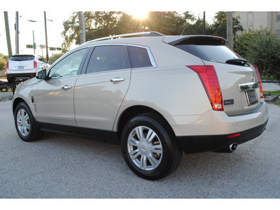 cadillac srx 2010 gold suv luxury collection gasoline 6 cylinders front wheel drive 6 speed automatic 77002