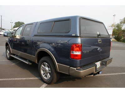ford f 150 2005 dk  blue lariat 8 cylinders automatic 98632