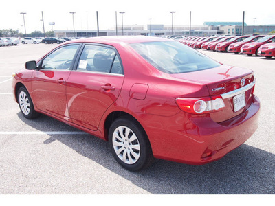toyota corolla 2013 red sedan le 4 cylinders automatic 77074