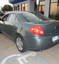 pontiac g6 2009 green sedan gasoline 4 cylinders front wheel drive automatic 79936