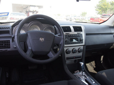 dodge avenger 2009 sky blue sedan sxt 4 cylinders automatic 77375