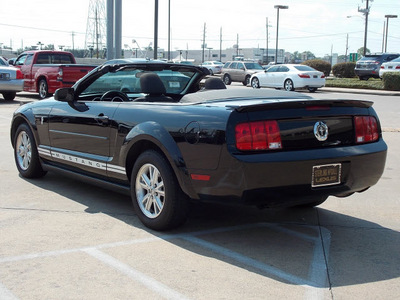 ford mustang 2007 black v6 deluxe 6 cylinders automatic with overdrive 77074