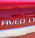 chevrolet aveo 2011 red sedan lt 4 cylinders automatic 76049