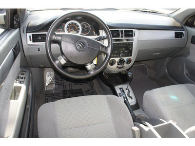 suzuki forenza 2006 beige sedan gasoline 4 cylinders front wheel drive automatic 78654