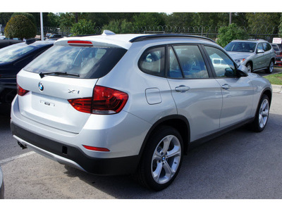 bmw x1 2013 silver xdrive35i gasoline 6 cylinders all whee drive automatic 78729