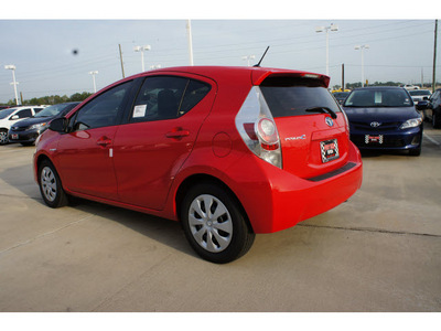 toyota prius c 2012 red hatchback one hybrid 4 cylinders front wheel drive automatic 77469