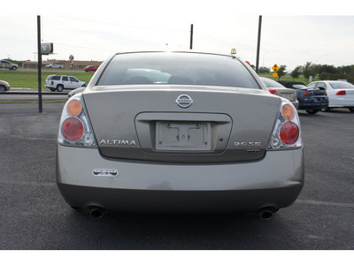 nissan altima 2003 champagne sedan 3 5 se gasoline 6 cylinders dohc front wheel drive automatic 76543