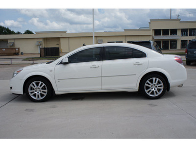saturn aura 2007 white sedan xe gasoline 6 cylinders front wheel drive automatic 77043