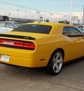 dodge challenger 2010 yellow coupe srt8 gasoline 8 cylinders rear wheel drive 6 speed manual 77074