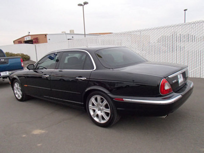 jaguar xj series 2005 black sedan xj8 gasoline 8 cylinders rear wheel drive automatic 99352