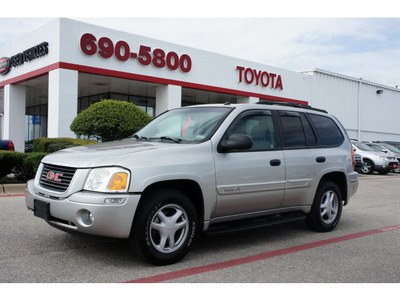 gmc envoy 2004 silver suv sle gasoline 6 cylinders rear wheel drive automatic 76543