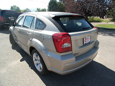 dodge caliber 2010 gold hatchback sxt gasoline 4 cylinders front wheel drive automatic 81212