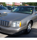cadillac deville 2003 brown sedan gasoline 8 cylinders dohc front wheel drive automatic 77018