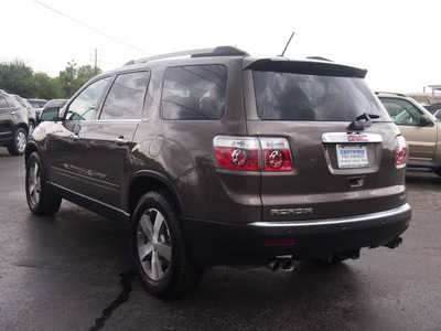 gmc acadia 2010 brown suv slt 1 gasoline 6 cylinders front wheel drive shiftable automatic 77074