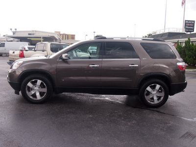 gmc acadia 2010 brown suv slt 1 gasoline 6 cylinders front wheel drive shiftable automatic 77074