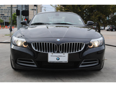 bmw z4 2010 black sdrive35i gasoline 6 cylinders rear wheel drive automatic 77002