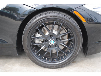 bmw z4 2010 black sdrive35i gasoline 6 cylinders rear wheel drive automatic 77002