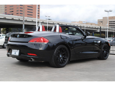 bmw z4 2010 black sdrive35i gasoline 6 cylinders rear wheel drive automatic 77002