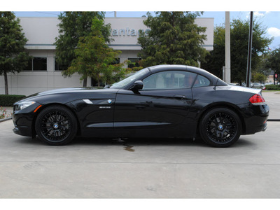 bmw z4 2010 black sdrive35i gasoline 6 cylinders rear wheel drive automatic 77002