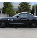 bmw z4 2010 black sdrive35i gasoline 6 cylinders rear wheel drive automatic 77002