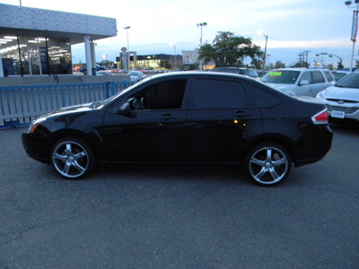 ford focus 2011 black sedan gasoline 4 cylinders front wheel drive automatic 79925