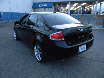 ford focus 2011 black sedan gasoline 4 cylinders front wheel drive automatic 79925