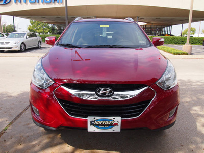 hyundai tucson 2013 garnet red limited gasoline 4 cylinders front wheel drive automatic 75075