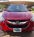 hyundai tucson 2013 garnet red limited gasoline 4 cylinders front wheel drive automatic 75075