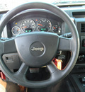 jeep liberty 2009 orange suv sport gasoline 6 cylinders 4 wheel drive automatic 79936