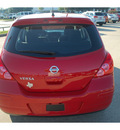 nissan versa 2012 red hatchback 1 8 s gasoline 4 cylinders front wheel drive automatic 77090