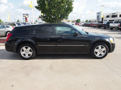 dodge magnum 2006 black wagon rt gasoline 8 cylinders all whee drive shiftable automatic 77388