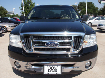 ford f 150 2008 black xlt 8 cylinders automatic with overdrive 76011