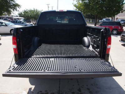 ford f 150 2008 black xlt 8 cylinders automatic with overdrive 76011