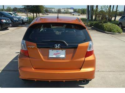 honda fit 2010 orange hatchback sport gasoline 4 cylinders front wheel drive automatic 77339