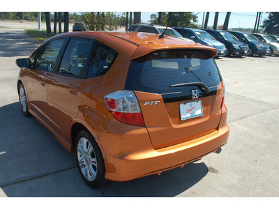 honda fit 2010 orange hatchback sport gasoline 4 cylinders front wheel drive automatic 77339