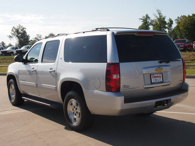chevrolet suburban 2012 silver suv lt 1500 8 cylinders automatic with overdrive 77656