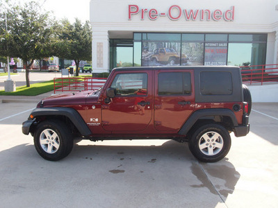 jeep wrangler unlimited 2008 dk  red suv x gasoline 6 cylinders 4 wheel drive automatic 76051